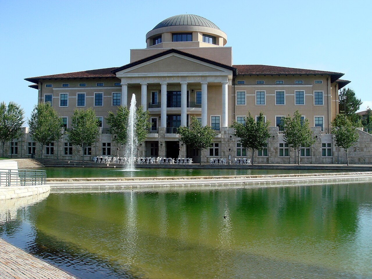 Founders Hall reflected in the water at Soka University of America in Aliso Viejo.