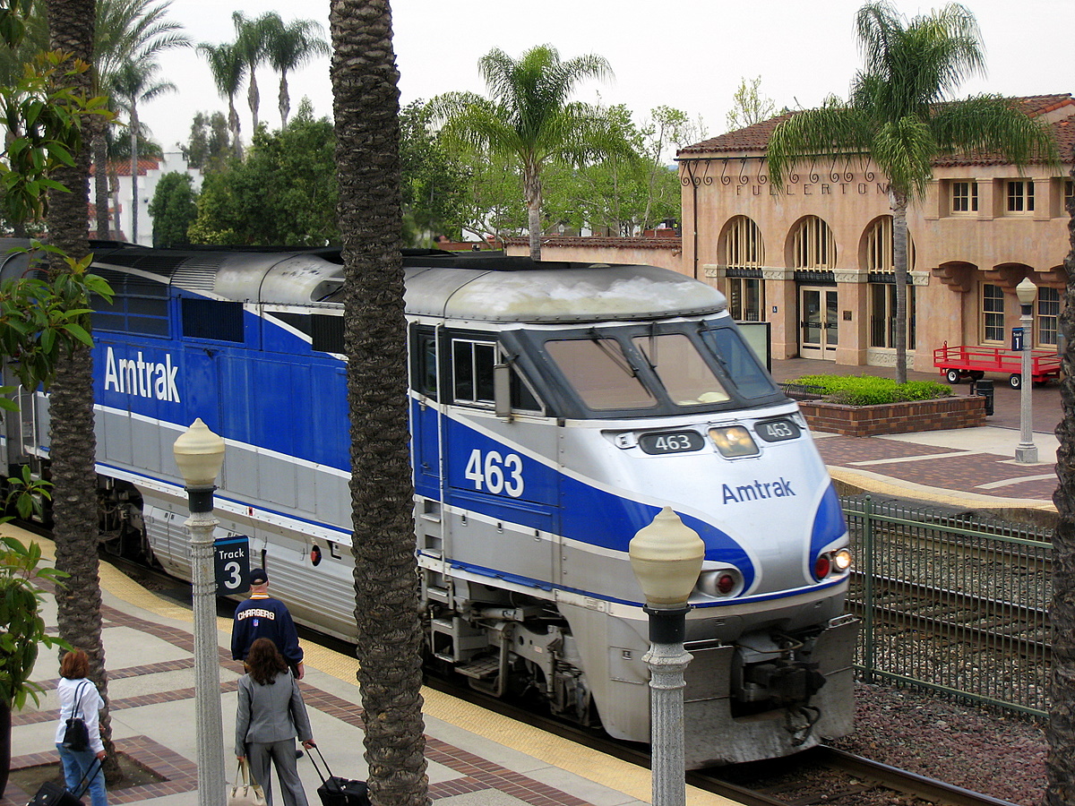 An Amtrak train beside the historic Santa Fe depot at Fullerton Transportation Center.